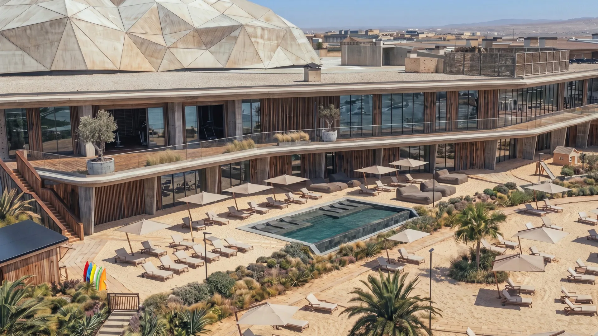 Vista generada con IA del edificio del club Gemswell Society, con terraza, piscina y tumbonas
