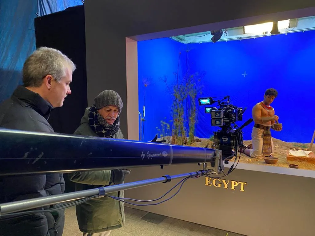 OCB Rolling Revolution shoot: crane camera filming an ancient Egypt scene against blue screen