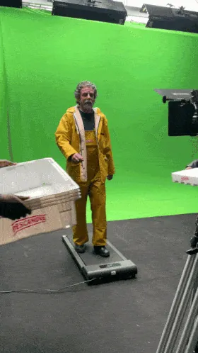 Pescanova shoot: actor in yellow oilskins walking on a treadmill against a green screen