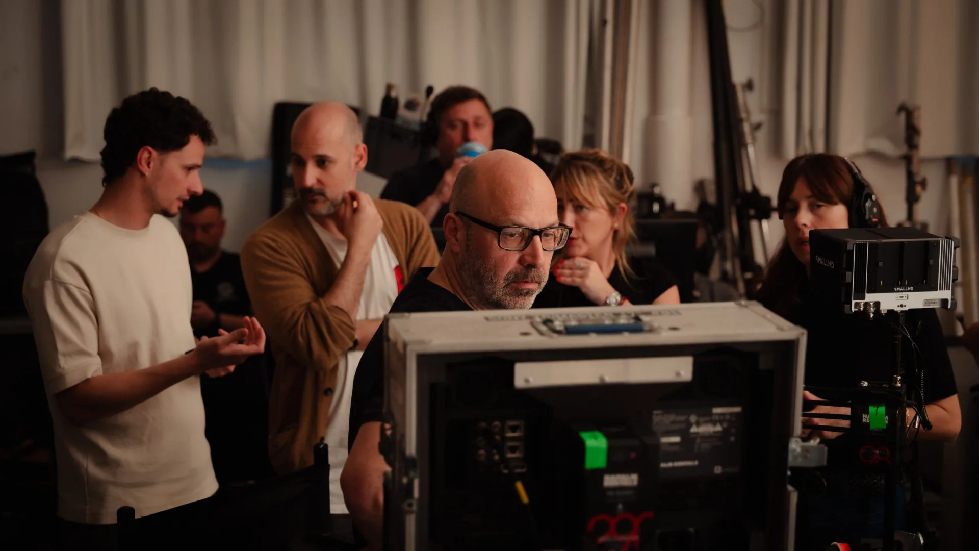 Sanex UAP shoot: crew following the take on monitors at the video village