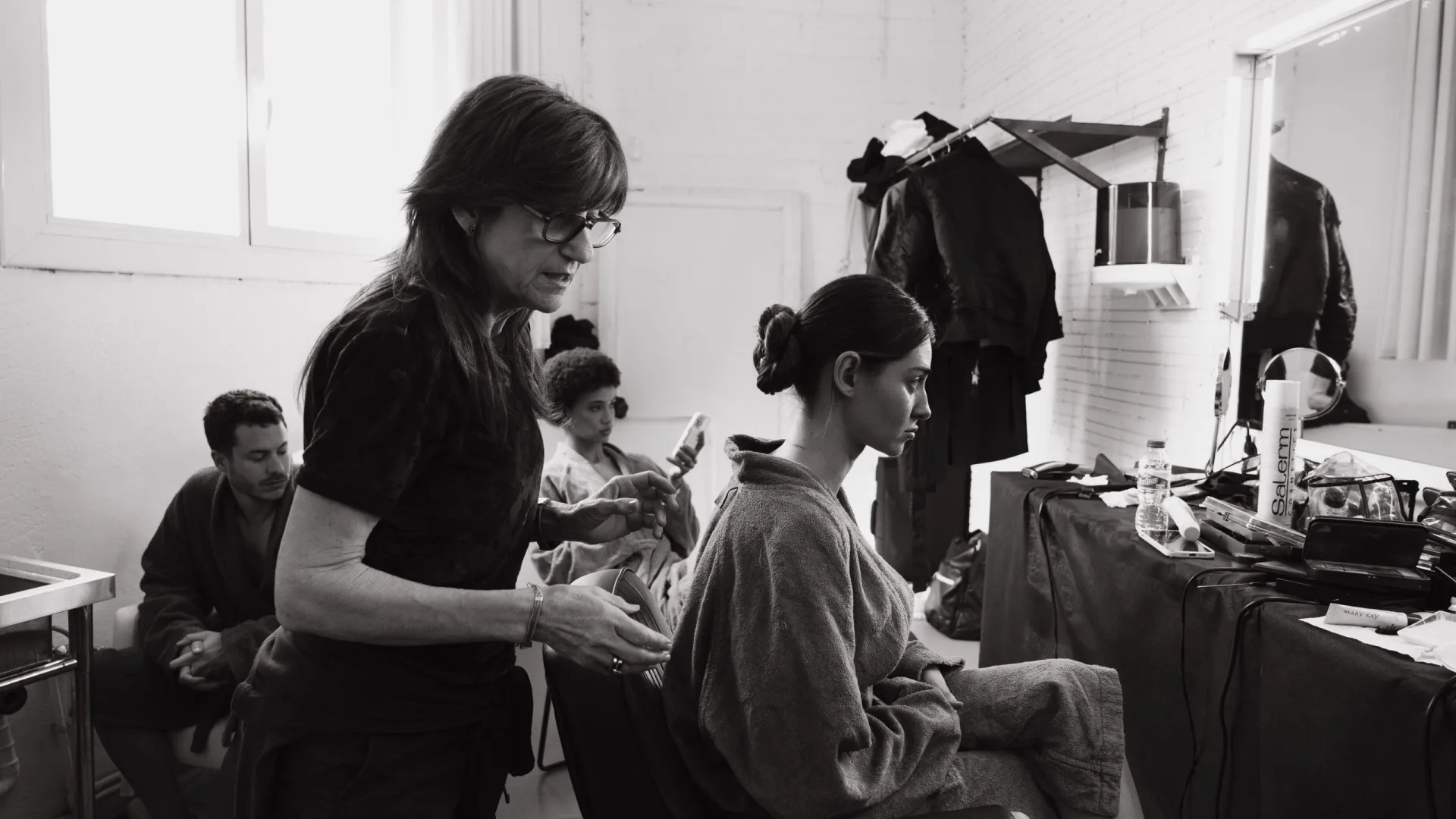 Sanex UAP making of: hair and make-up session for a model in the dressing room, black and white