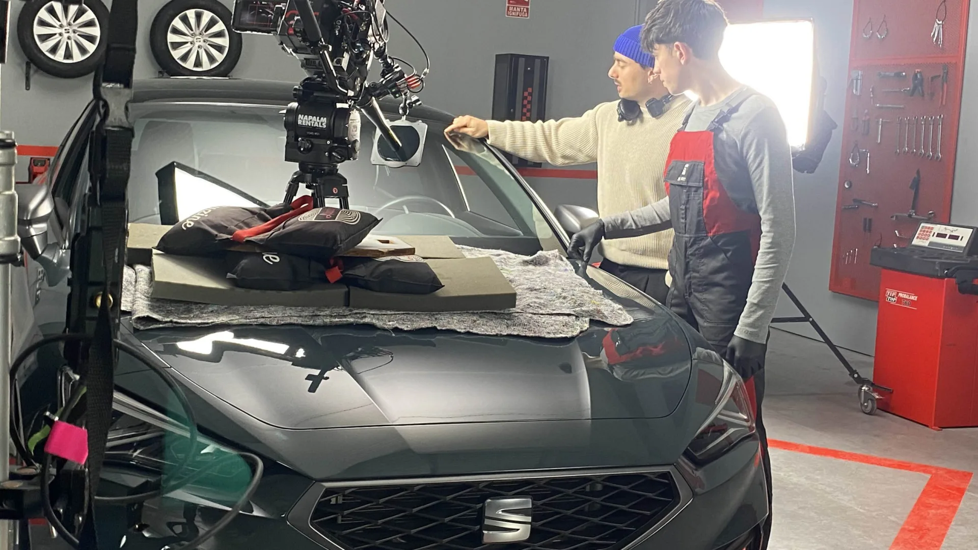 Seat Connect shoot: camera rigged on a Seat León bonnet while actors rehearse in the workshop set