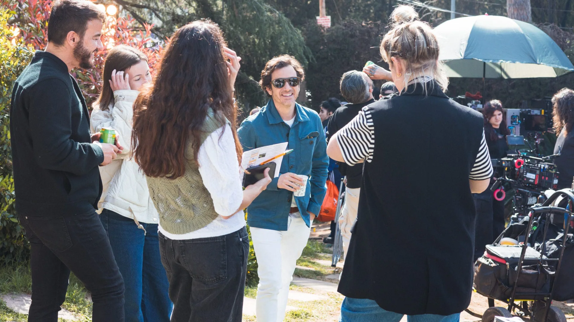 Shredded Wheat shoot: crew chatting in the garden location between takes
