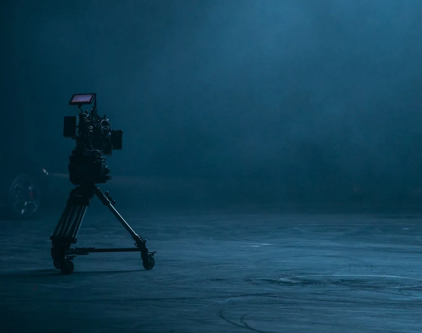 Volkswagen Golf GTI shoot: camera on a wheeled tripod alone in a dark, smoky studio
