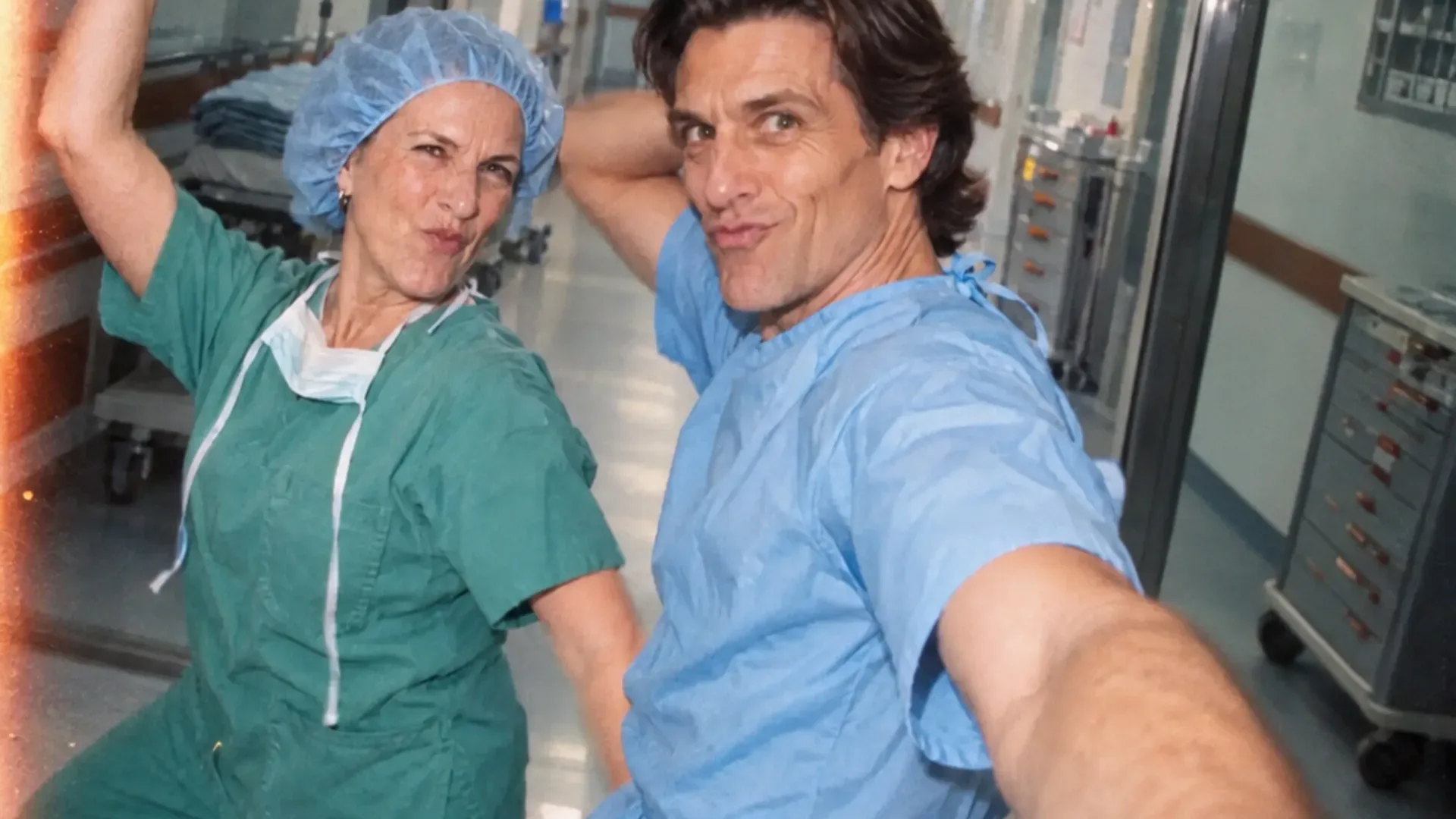 AI-generated mock behind-the-scenes selfie: the surgeon and the patient from the Aegon spot dance in a corridor